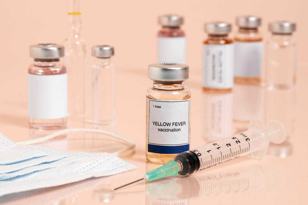 An inverted bottle pouring white and yellow pills with an hourglass on the corner of the photo, symbolizing the innovative biological medicines provided by Saudi RNA Company.
                        
